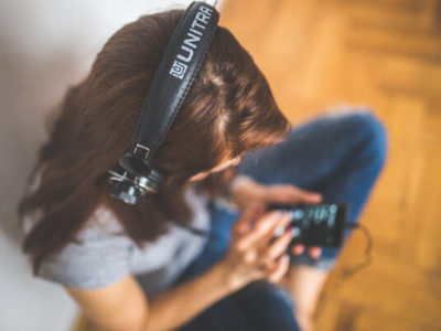 Girl listening to music with headphones