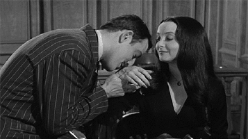 http://giphy.com/search/morticia-addams