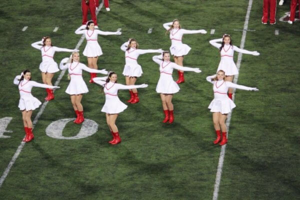 The Redsteppers, Indiana University's dance team, performing during halftime at Memorial Stadium.