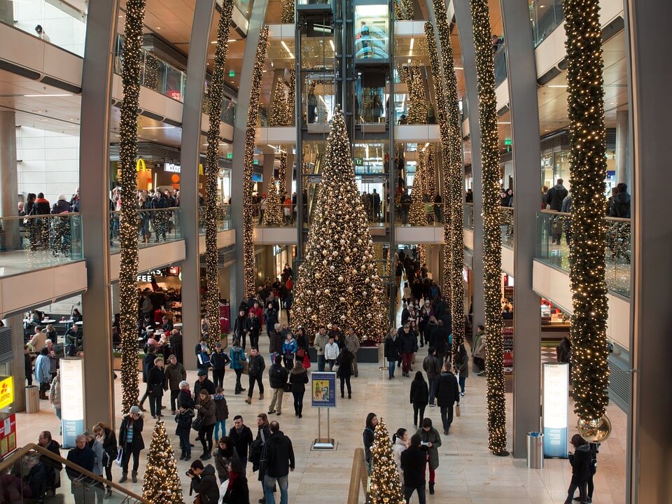 crowds of people holiday shop in the mall in austin