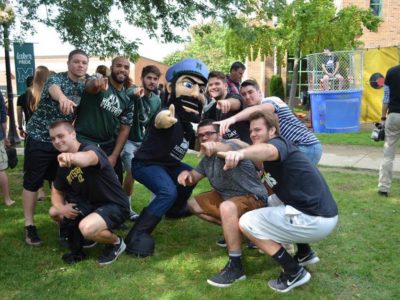 Mercyhurst students with the school mascot