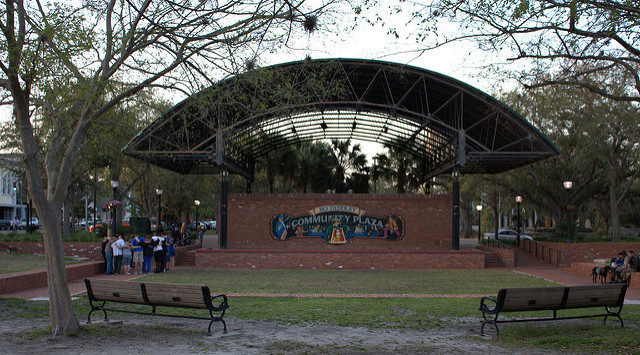 A view of the concert stage overlooking the grassy field in Bo Diddley Plaza in Gainesville