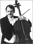 This picture shows Prof. Timothy Eddy from Juilliard with his cello in black and white.