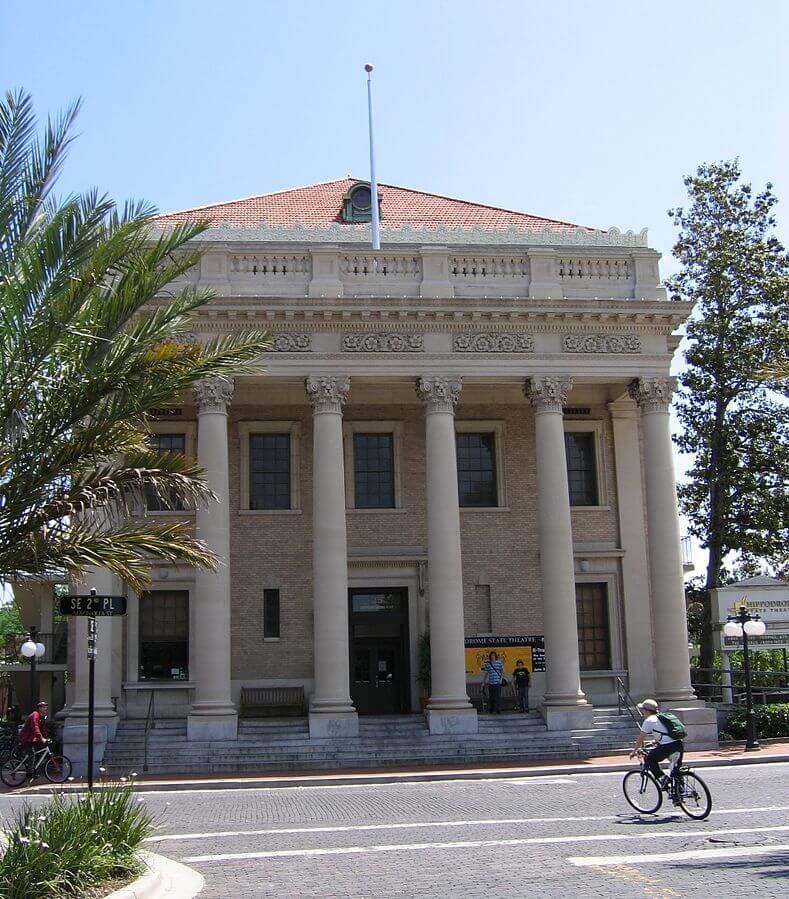 A frontal view of the Hippodrome Theatre in Gainesville, displaying its prominent columns.