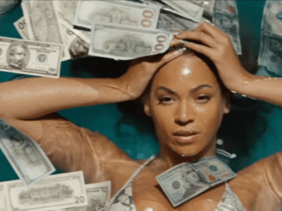 Beyonce in a pool of money