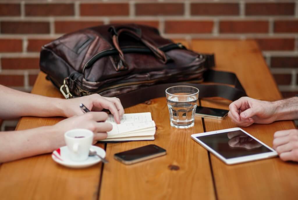 people plan meetings by having effective writing skills 