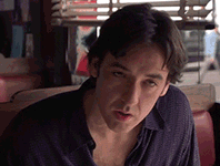 This picture shows John Cusack looking annoyed and confused.