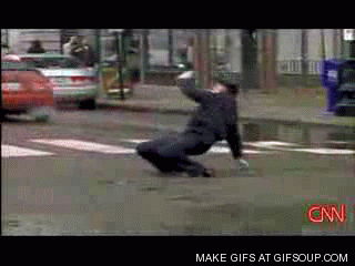 This cop knows how to enjoy directing traffic with those dance moves.