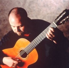 This picture shows Prof. Scott Tennant from University of Southern California (USC) playing his guitar.
