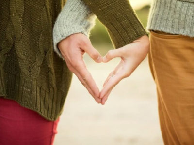 Valentine's Day Picnic- a couple holding hands in the shape of a heart