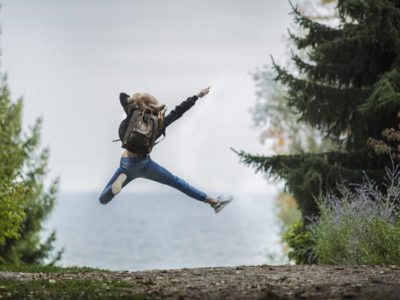 Jump for joy in nature on your solo spring break trip.