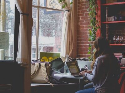 student studying on her laptop for her double major