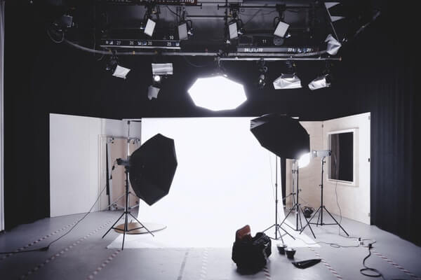 Brightly lit photo studio how to get started in the film industry