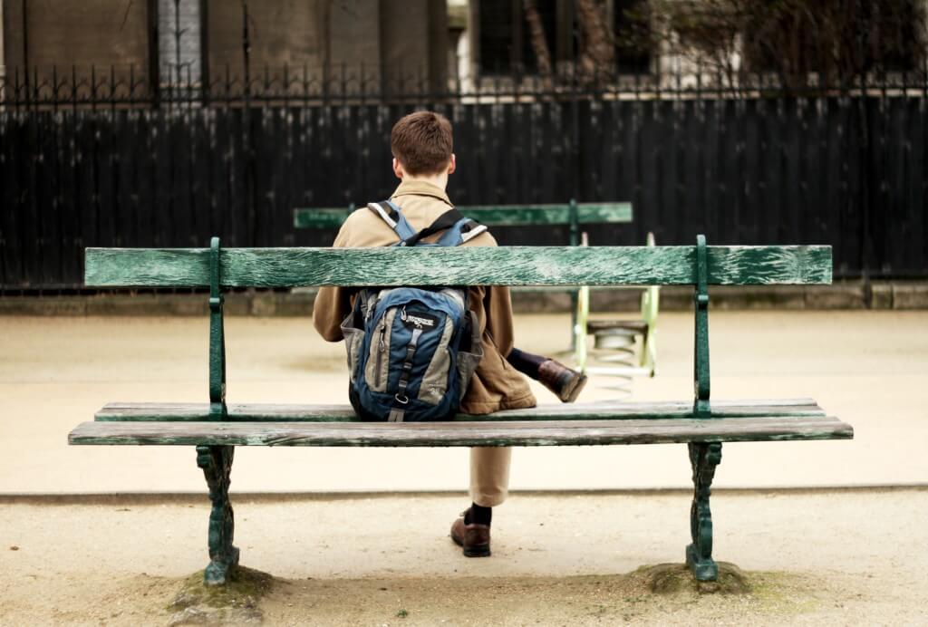 man on a bench practicing mindfulness