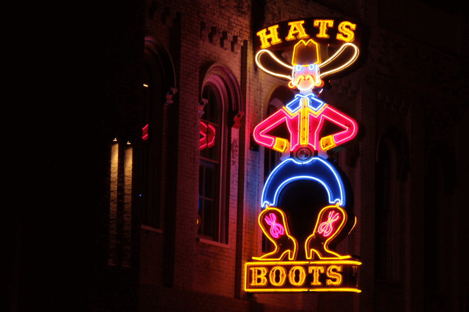 Hats and Boots sign in Nashville cheap airfare