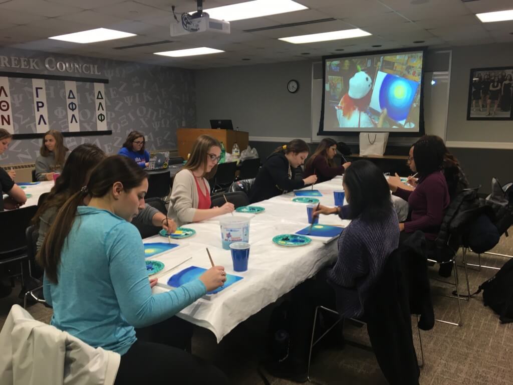 Members Painting at Meeting university of iowa student orgs