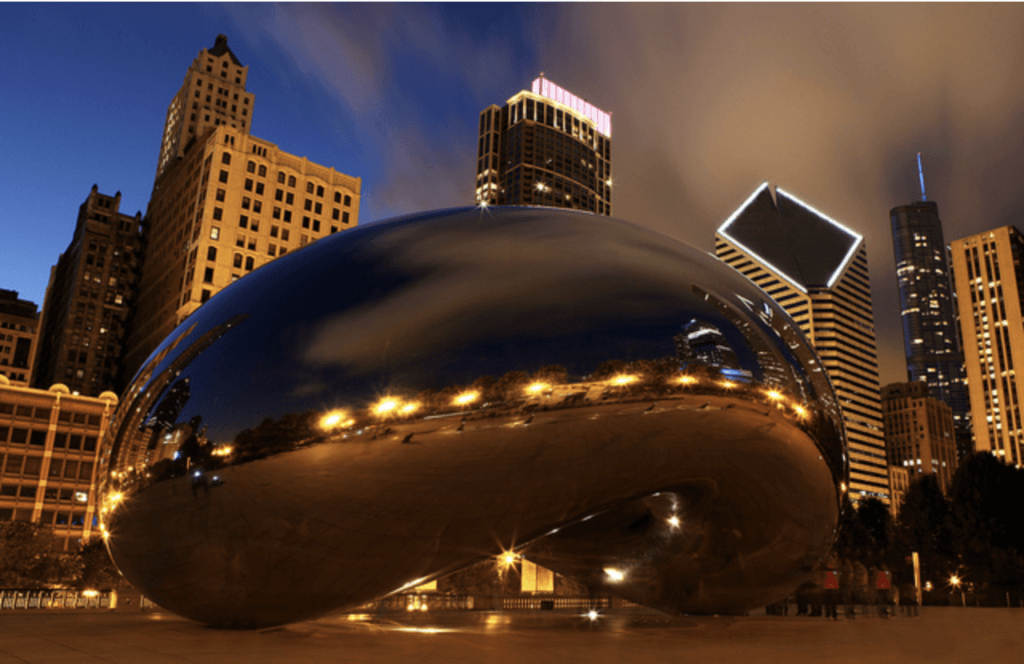 The Bean Reflecting City Lights at Night