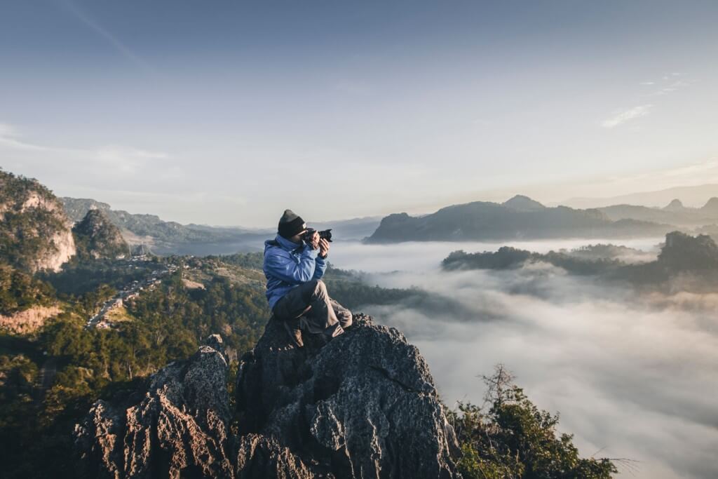 photographing a cliffside