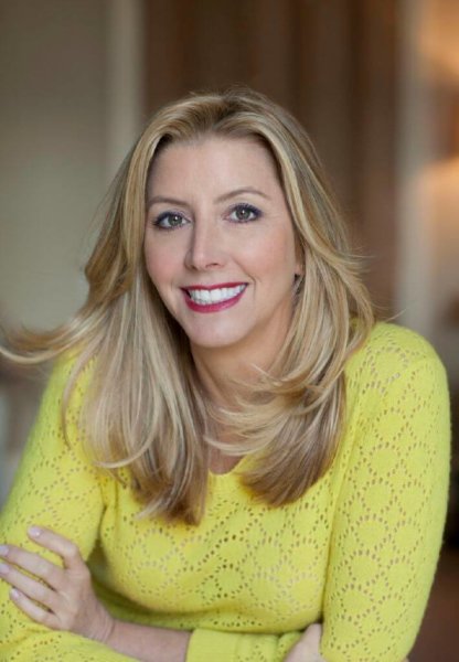 Sara Blakely posing.