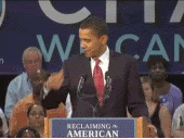 Barack Obama brushing off his shoulders