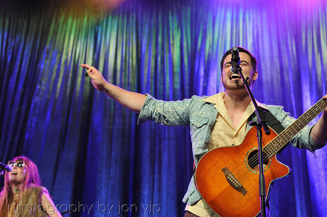 man with guitar performing
