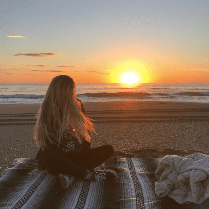 girl sunrise beach