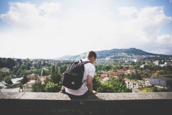 student tips- guy wearing a backpack