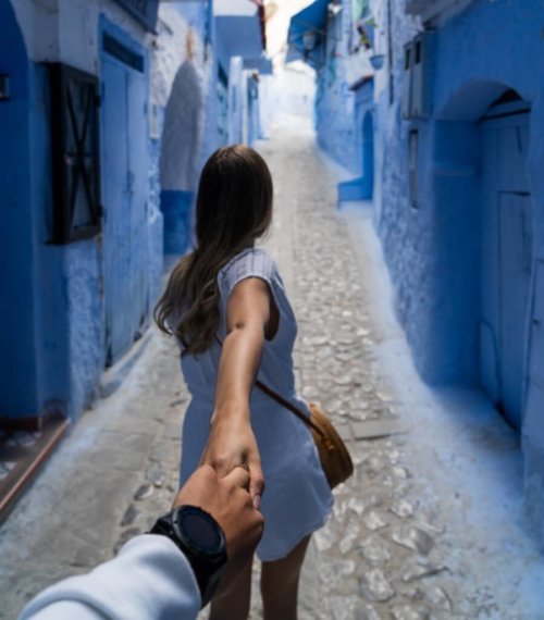 How to ask a shy guy out- woman leading man by hand.