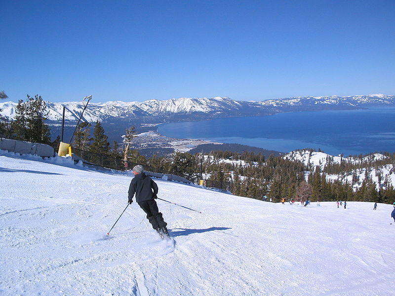 Sierra Nevada College Best Colleges for Skiers skiing down a mountain