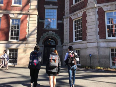 Fomo meaning walking into campus building