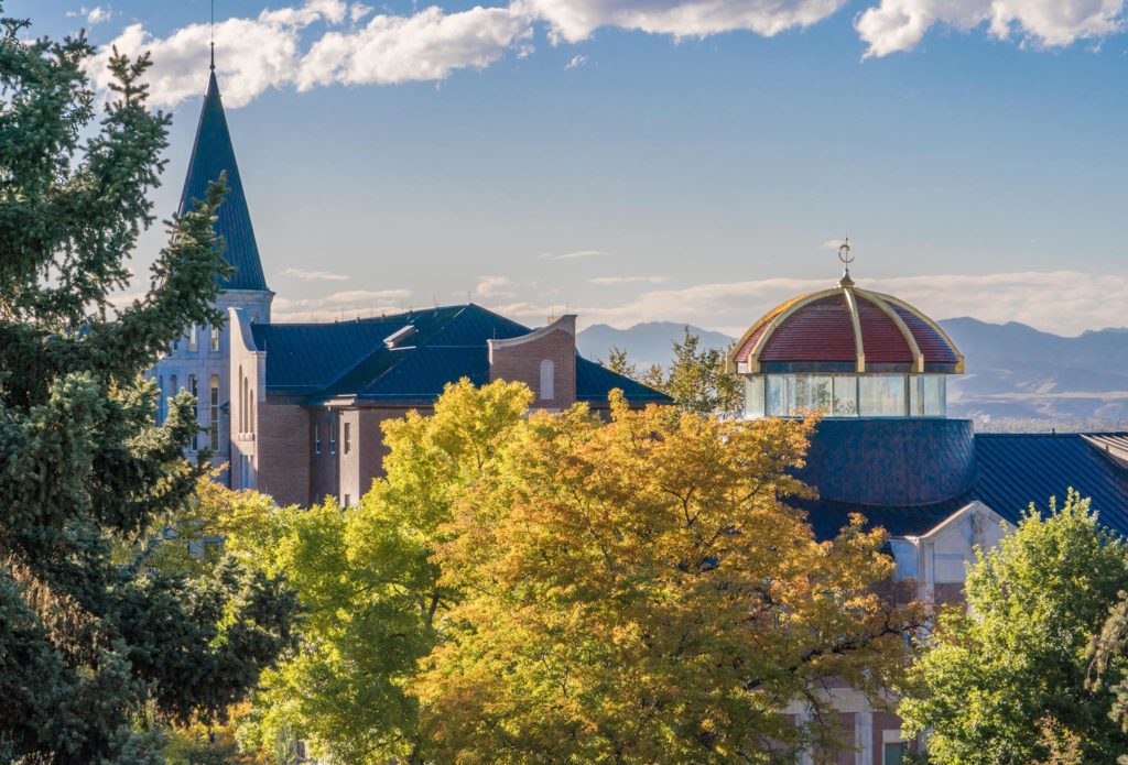 University of Denver campus with mountains in background Best Colleges For Skiers