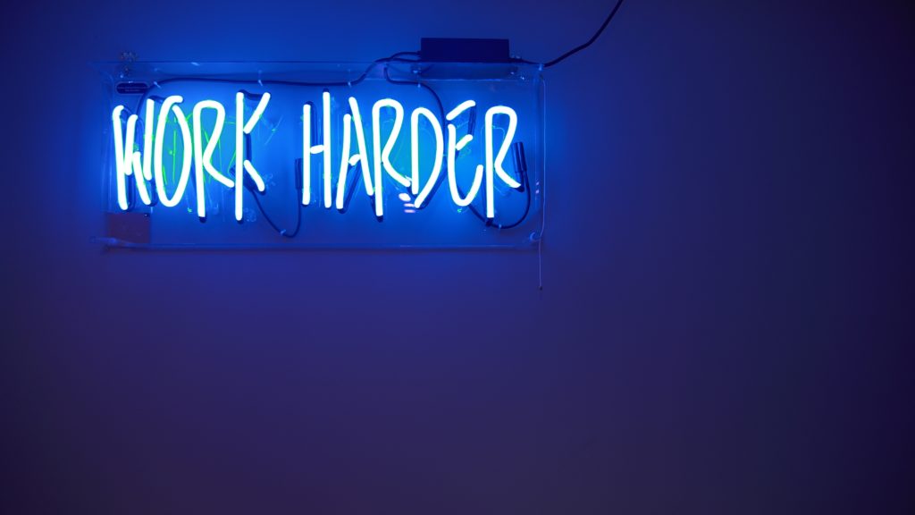 sign saying "work harder" interpersonal skills