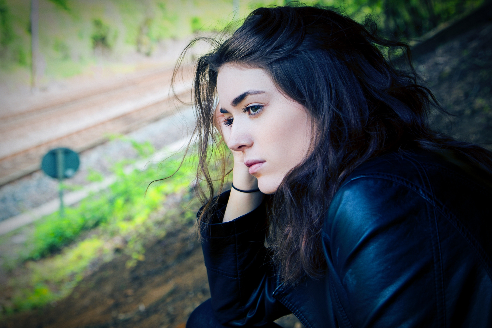 girl gazing off with worry