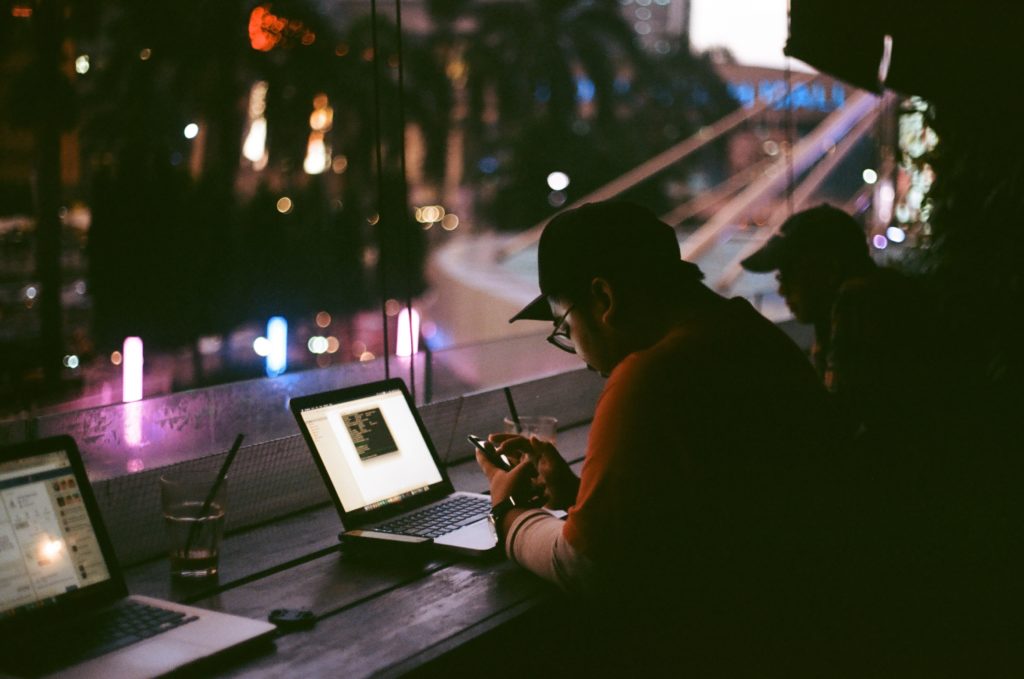 guy looking at computer