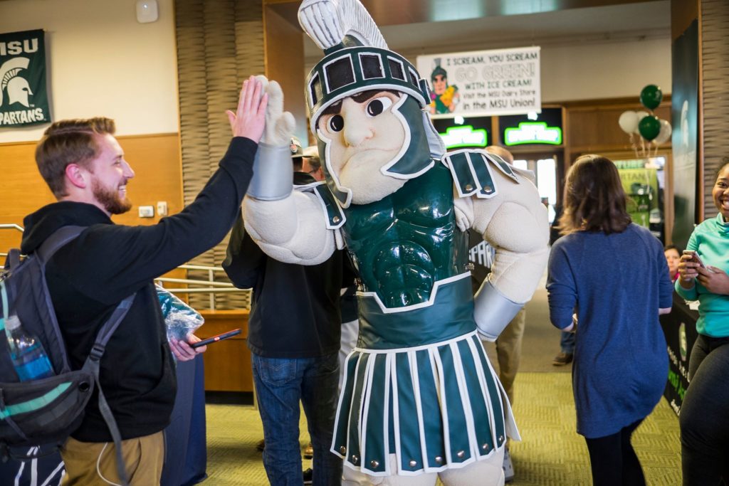 high five spartan mascot