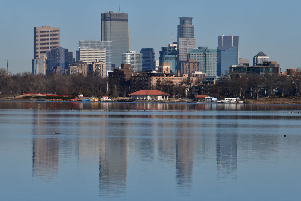 Lake with city skyline in background