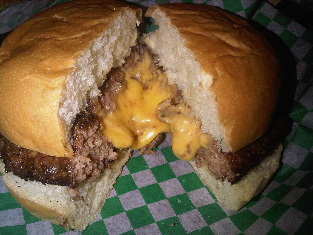 Cheese oozing from juicy lucy patty