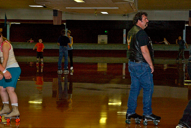 man and people rollerblading portland