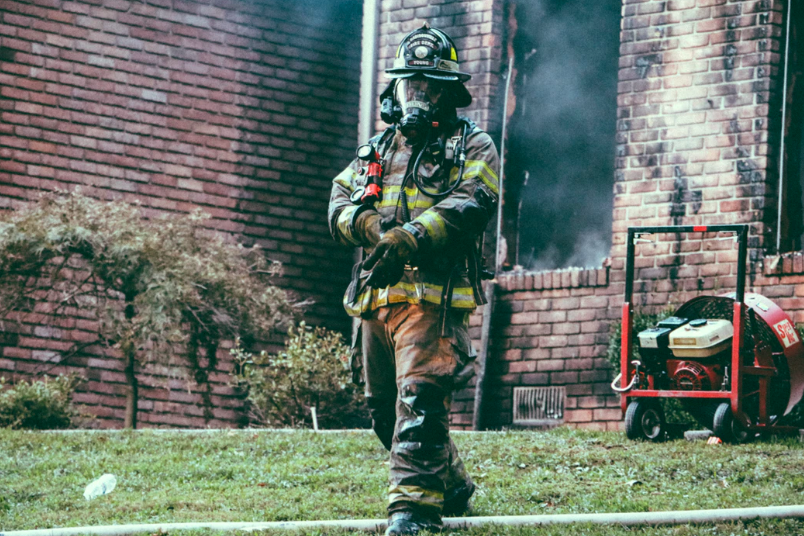 firefighter holding arm