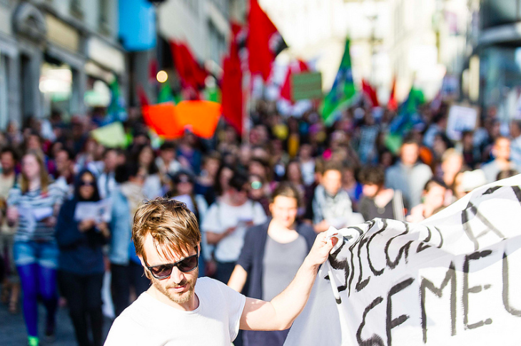 protest with flags millennial generation