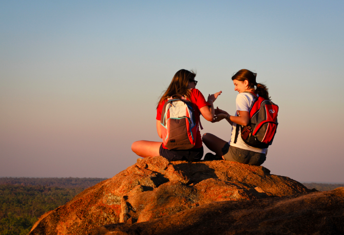 millennial generation friends on mountain hike