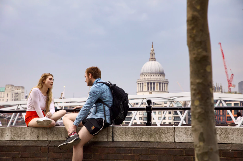 couple talking near capitol building millennial generation