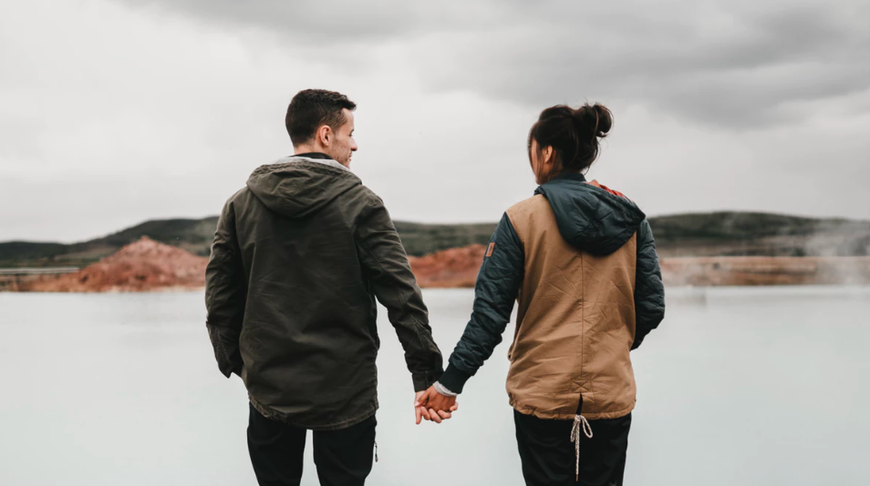 couple holding hands millennial generation