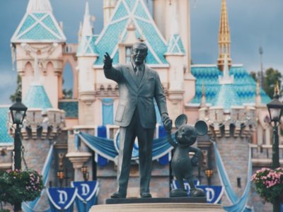 walt disney with mickey statue