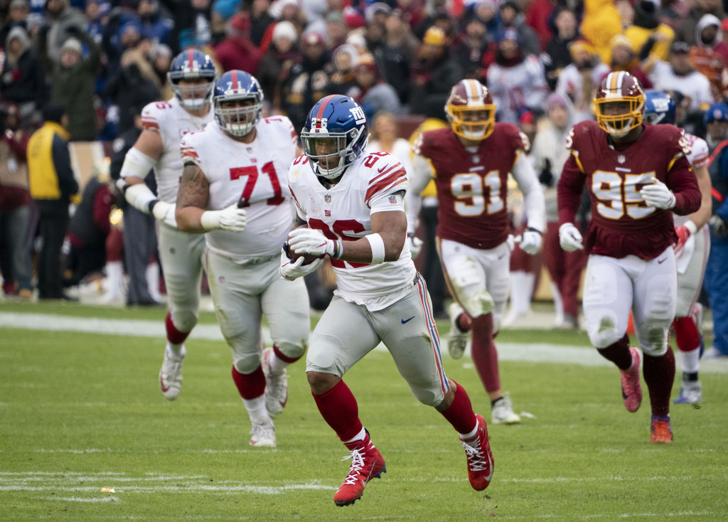 picture of Saquon running/