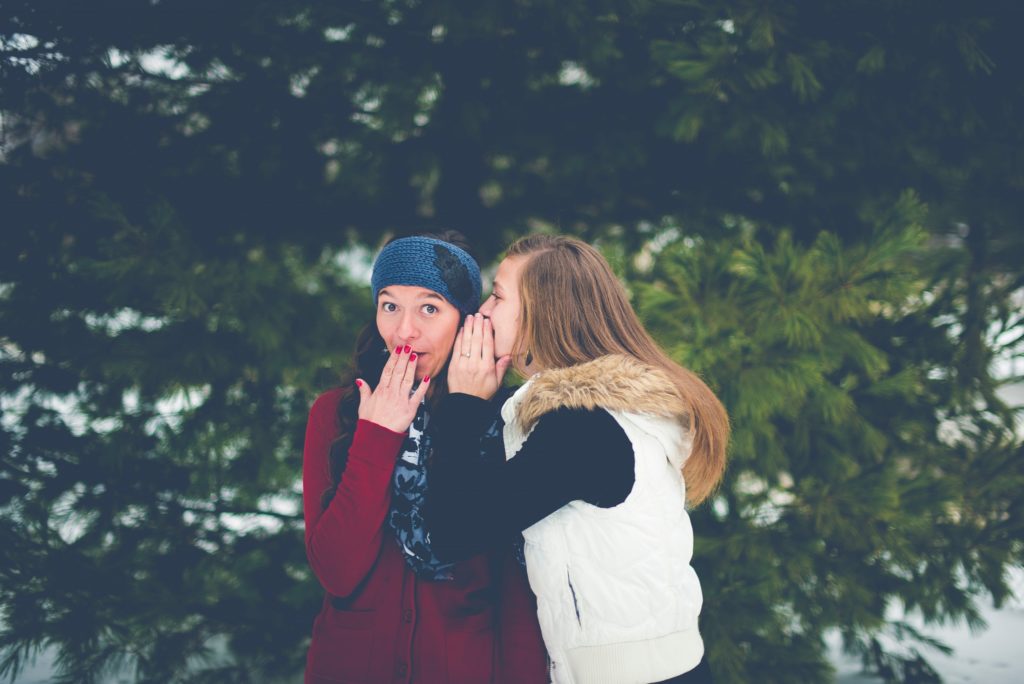 friends talking in snow