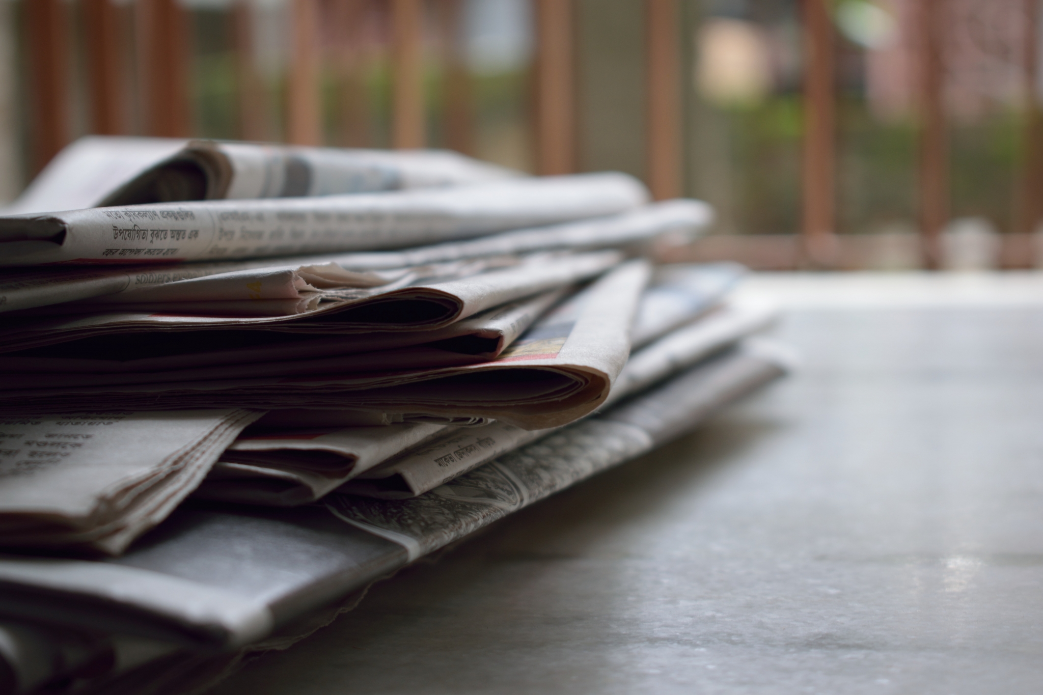 sports journalism papers on desk