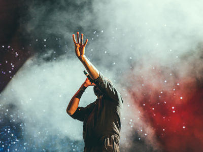 Man Singing at a Concert