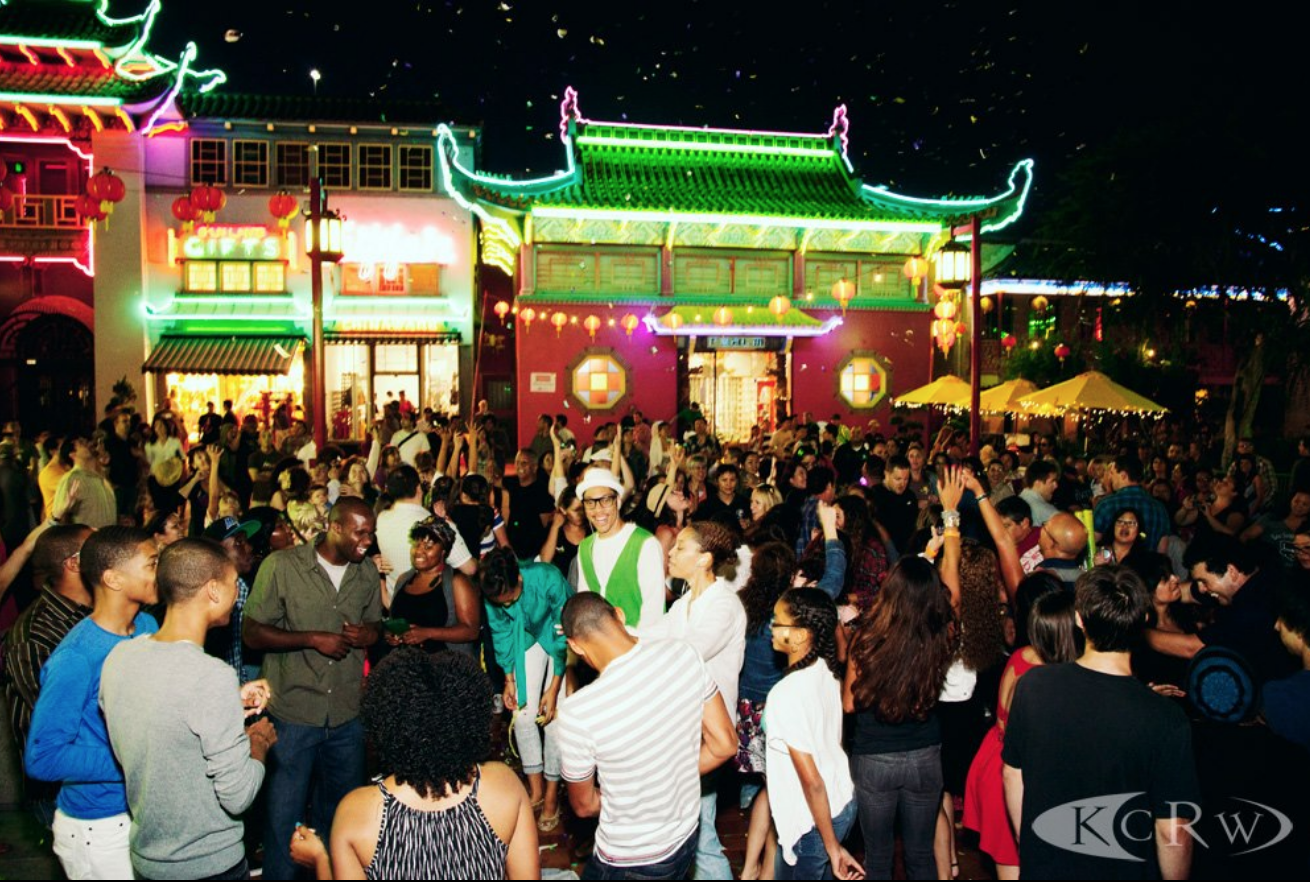 A group of people celebrate at Chinatown Summer Nights