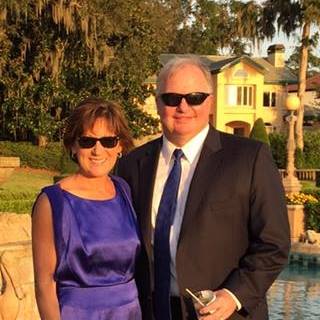 Mark and Robyn Sieron pose for an outdoor photo.